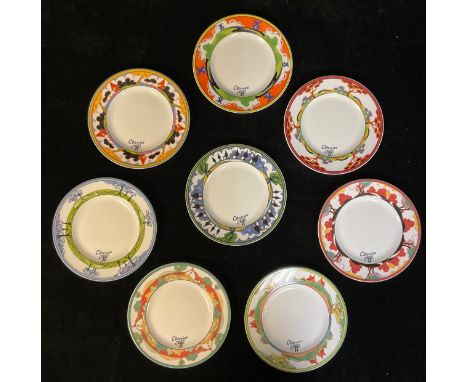 A set of eight Wedgwood for Bradex Clarice Cliff reproduction "Café Chic" dessert plates, including Brookfields, Summerhouse,