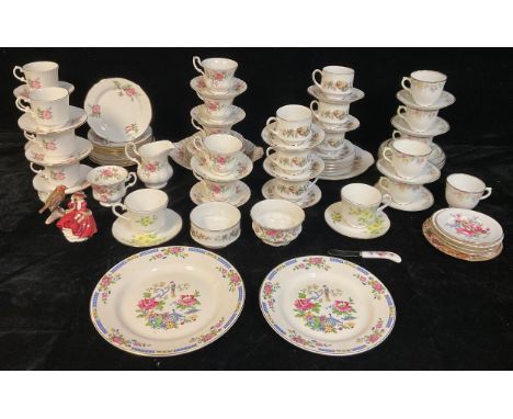 A Royal Albert Moss Rose pattern tea service for six comprising cake plate, side plates, cream jug, sugar bowl, cups and sauc