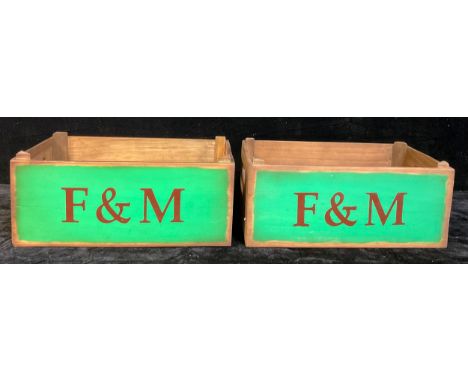 A contemporary pair of wooden crates, each advertising F &amp; M, 44cm long 