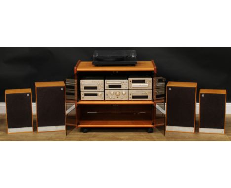 A TEAC 300 series Hi-Fi system, composing H300 stereo amplifier, stereo cassette deck, AM/FM stereo tuner, Compact Disc playe