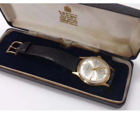 Garrard 9ct automatic gentleman's wristwatch, London 1980, silvered dial with Arabic twelve, baton markers, outer minute mark