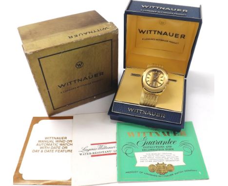 Wittnauer automatic oval cased gold plated and stainless steel gentleman's bracelet watch, two-tone dial with baton markers, 
