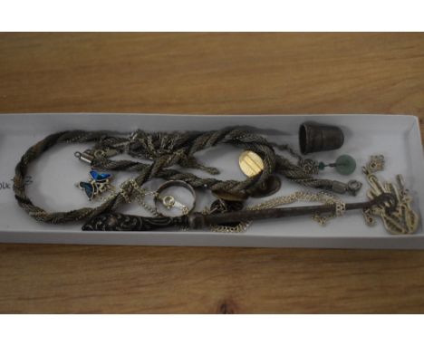 An assorted collection of silver and white metal, including a rope twist chain, button hook with silver handle, a filigree st