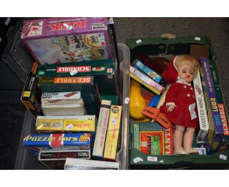 An assortment of vintage board games including Scrabble, Ludo, Master mind and a set of Draughts, also included is a doll and