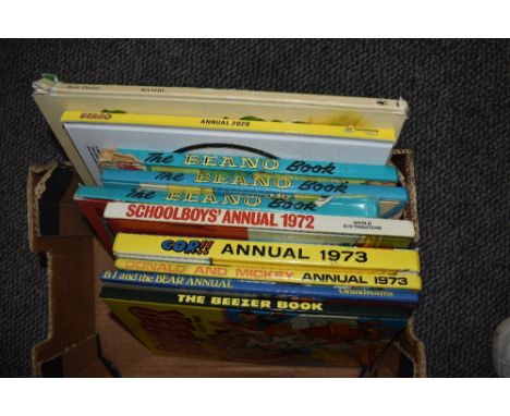 A box of vintage 1970s and other children's annuals including The Beano, The Beezer, and Bambi