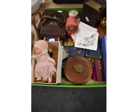 A miscellany of vintage and antique items, to include; doll, boxed bible and prayer books, needle case, handkerchiefs, tape m