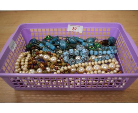 A collection of costume jewellery including synthetic pearl and turquoise coloured bead necklaces