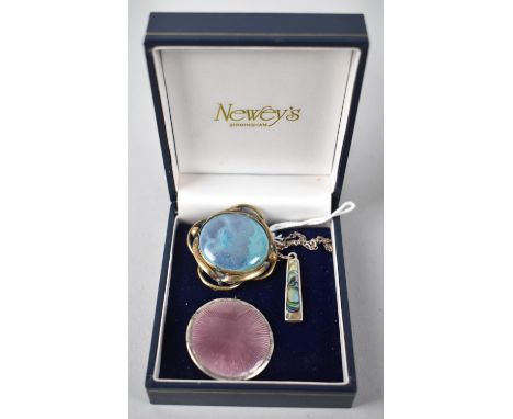 A Ruskin Pottery Cabochon Brooch, Circular Enamel on Silver Brooch and an Abalone Pendant on Chain 