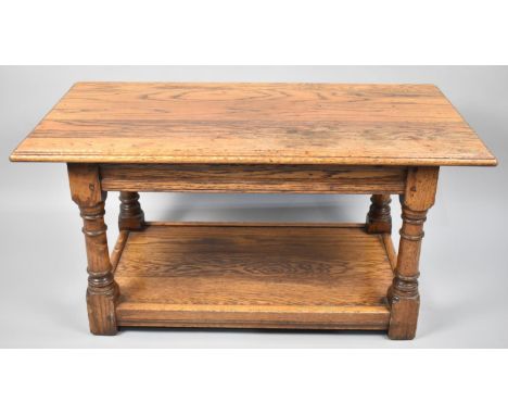 A Mid 20th century Oak Rectangular Coffee Table with Turned Supports and Stretcher Shelf, 91cms Wide 