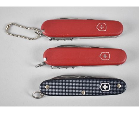 A Collection of Three Victorinox Swiss Army Knives 