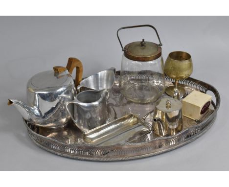 A Silver Plated Galleried Tray together with a Three Piece Picquot Tea Service, Crumb Tray, Silver Plate and Glass Biscuit Ba