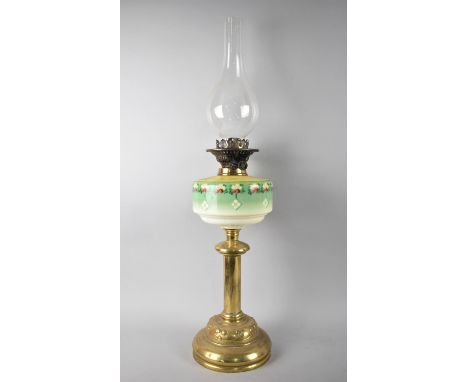 A Late Victorian Brass Based Oil Lamp with Decorated Glass Reservoir and Etched Globe Shade, Duplex Control, 70cms High 
