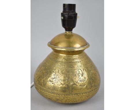 A Small Indian Brass Table Lamp with Engraved Hindu God Decoration, 20cms High 