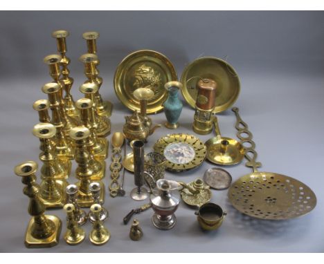 VINTAGE &amp; LATER BRASSWARE - a good quantity of candlesticks, repousse plaques and a reproduction brass and copper miner's