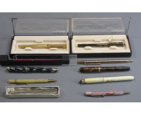 FOUNTAIN &amp; BALLPOINT PENS, A COLLECTION - a (1930s-40s) black and grey flame pattern 'Golden Guinea' fountain pen (possib