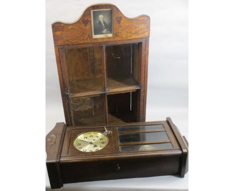 PENDULUM WALL CLOCK, oak cased and a single glazed door antique cupboard with inlaid and poker work detail, dated 1848 with a