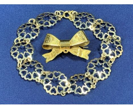 9CT GOLD LINK BRACELET, 4.4grms, and a 9ct gold bow pin brooch with bright cut decoration, 2.5grms, total 6.9grms