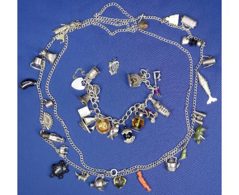 SILVER CHARM JEWELLERY - to include a 72cms L 800 stamped necklace holding 25 charms including Norwegian silver enamel, sterl