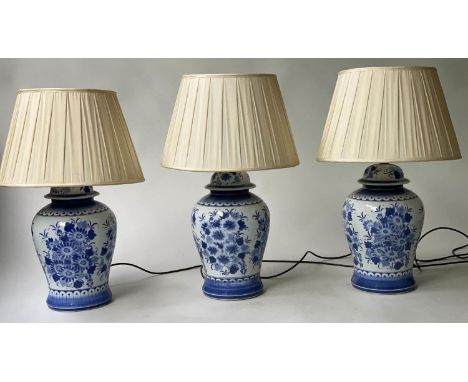TABLE LAMPS, a set of three, Chinese blue and white ceramic of ginger jar form with pleated shades, 66cm H. (3) 
