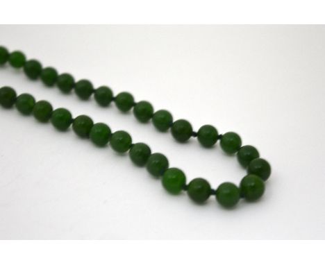 A BEADED JADE NECKLACE