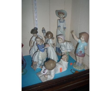EIGHT VARIOUS NAO FIGURES, (8)