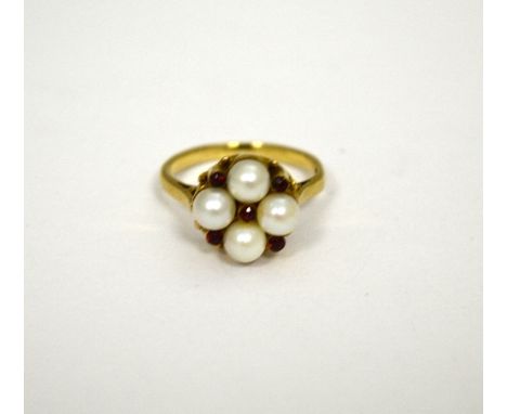 A PEARL AND GARNET CLUSTER RING, ring size K 1/2