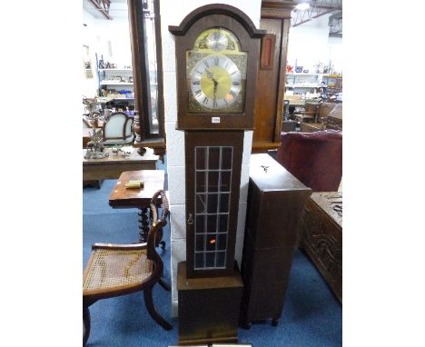 AN OAK GRANDMOTHER CLOCK, with lead glazed door, face marked Made in Germany 'Pallesgaard Clock Copenhagen' Danish label insi