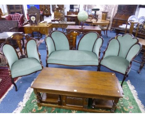 AN EDWARDIAN INLAID THREE PIECE PARLOUR SUITE, with green upholstery, comprising two seater sofa and two chairs