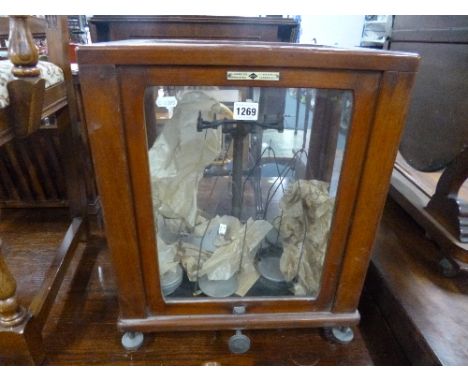 A SET OF CASED BALANCE SCALES, ' W and J George Ltd Birmingham 3, Nivoc, F E Becker & Co London EC1' label attached