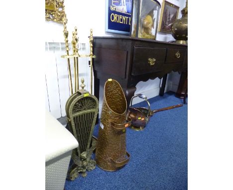 A SET OF BRASS FIRE IRONS ON STAND, two copper coal scuttles, firescreen and a warming pan (5)