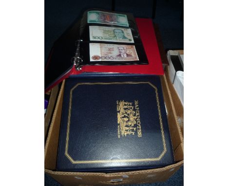 A LARGE BOX CONTAINING BANKNOTES AND COIN COVERS, to include three albums of World banknotes, many crisp uncirculated with on