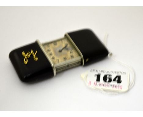 A BLACK ENAMEL 1930'S PURSE WATCH, with 'Joy' on case Reg No.504847