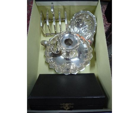 SILVER PLATE, to include toast rack, cased open salts, candlestick and snuffer and shell dish on three ball feet (4)