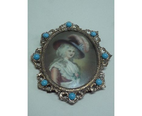 AN OVAL PORTRAIT MINIATURE, depicting maiden signed to bottom right (a/f) set in white metal frame with turquoise stone mount