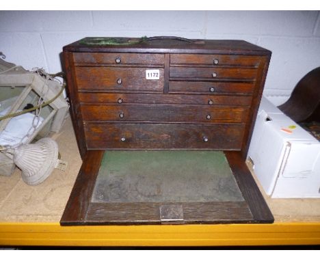 AN ENGINEERS TOOLCHEST, with eight drawers of varying sizes, containing a small quantity of tools (key)