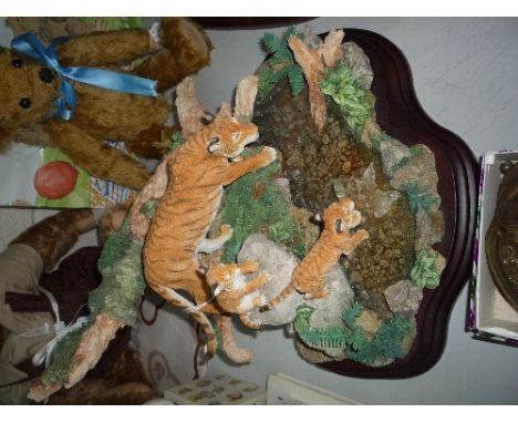A ROYAL DOULTON LIMITED EDITION SCULPTURE, of Tigers by pool, 192/950, by K. Sherwin
