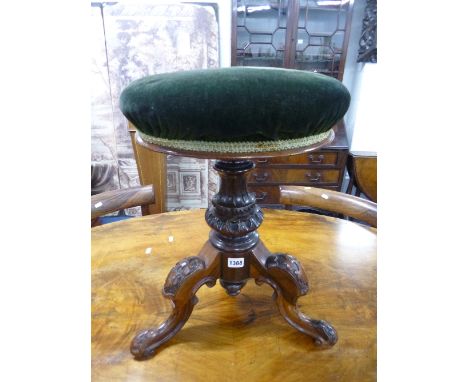 A VICTORIAN SWIVEL PIANO STOOL, with carved rosewood tripod support