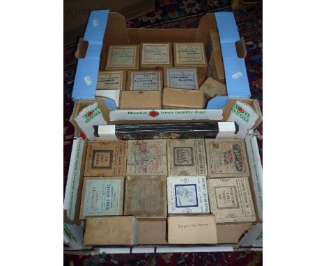 TWO BOXES OF MAGIC LANTERN SLIDES, to include 'Alice in Wonderland', 'The Boer War', 'The Honey Stealers', etc