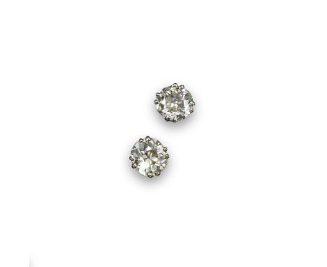 A pair of diamond stud earrings, the old cushion-shaped diamonds weigh approximately 1.60cts each, set in white gold.