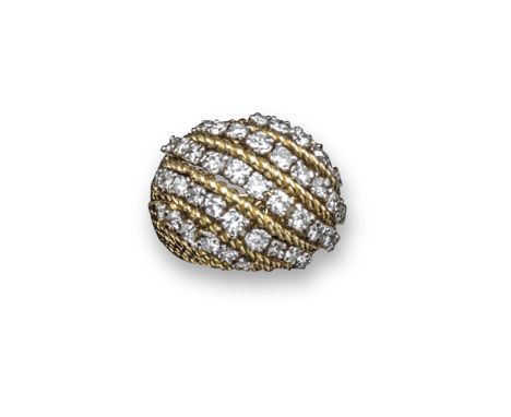 A diamond set scrolling bombe cluster ring by Kutchinsky, set with five scrolling lines of graduated round brilliant-cut diam