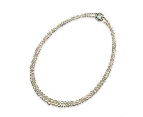 A two row natural pearl necklace, the clasp set with an emerald-cut aquamarine within a surround of cushion-shaped diamonds i