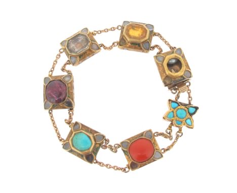 An Indian gem-set gold bracelet, the rectangular panels are set with coral, turquoise, a ruby, a diamond a yellow sapphire an