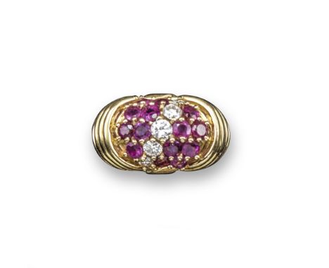A ruby and diamond bombe-shaped ring by Kutchinsky, the top section set with a cluster of circular-cut rubies divided by a li
