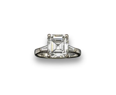 A diamond solitaire ring, the slightly rectangular emerald cut diamond weighs approximately 4.20cts and is set in platinum wi