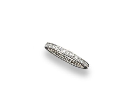 A diamond full circle eternity ring, set with single-cut diamonds in platinum. Size O.