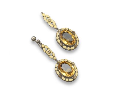 A pair of Arts and Crafts drop earrings in the manner of Bernard Instone, the oval-shaped citrines are mounted in yellow enam