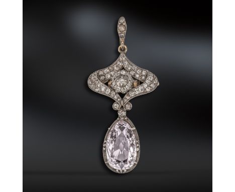 An Art Nouveau pink and white diamond pendant, the pear-shaped pink diamond weighs 2.77cts and suspends from a scroll mount s