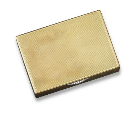 A gold box by Cartier, of rectagular form with engine-turned decoration and diamond-set thumbpiece. Marked J.C and 9ct, with 