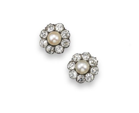 A pair of pearl and diamond cluster earrings, each natural saltwater pearl is set within a surround of eight cushion shaped d