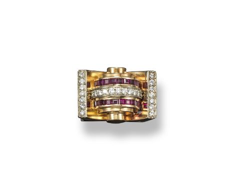 A ruby and diamond Odeonesque ring, of architechtural design and set with lines of calibre-cut rubies and circular-cut diamon